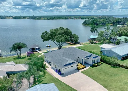 Newer Home on Lake June with Beach, Dock, Screened Patio and Hot Tub!