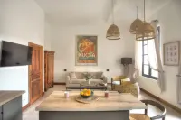South-facing suite with terrace in town center