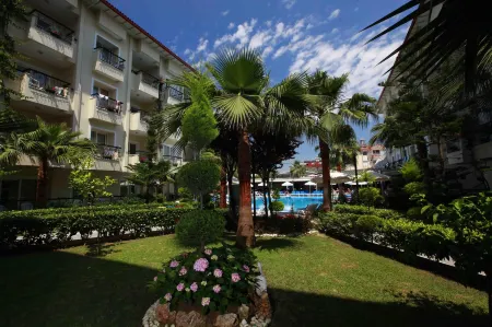 Sun City Apartments & Hotel Отели рядом с достопримечательностью «Храм Аполлона»