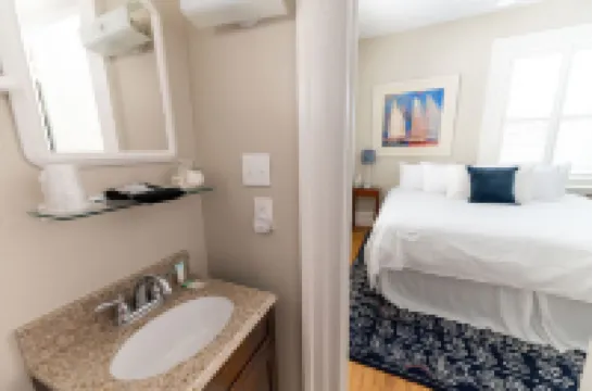 Charming Sitting Porch and Cozy Amenities - Delightful Escape