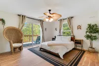 Dog-friendly riverfront retreat with hot tub on 5.2 acres near the beach