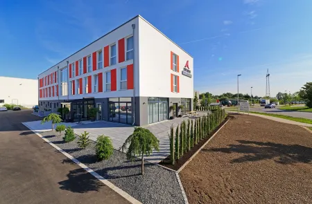 Amaro Hotel Bergkirchen Отели в г. Ольхинг