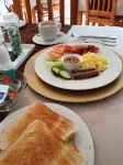 Harmony Guesthouse - servizio colazione