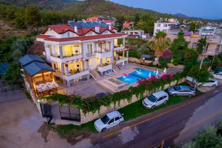 Anatolian Apartments & Bungalows Отели в г. Ciftlik Mahallesi