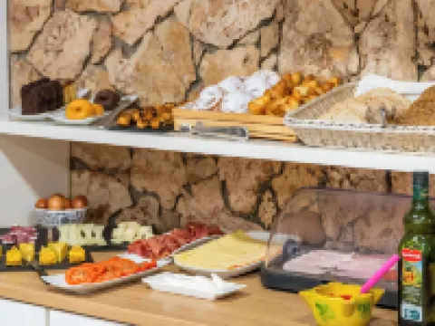 ホスタル メヌルカ シウタデリャのホテル