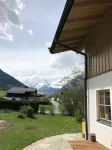Spacious, sunny country house in the Alps with its own garden
