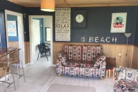 Unplug and reconnect at a kiwiana bach - 2020 finalist Bach of the year awards Hotels in Foxton Beach