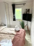 Great vacation home Rybak with box spring beds and large covered terrace