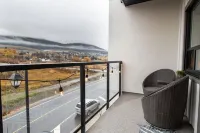 Lake Okanagan brand new beach condo with AC, heated outdoor pool, patio and BBQ.
