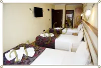 TJ's Hotel