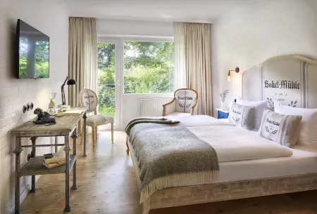 Bokel-Mühle am See Отели в г. Бад-Брамштедт