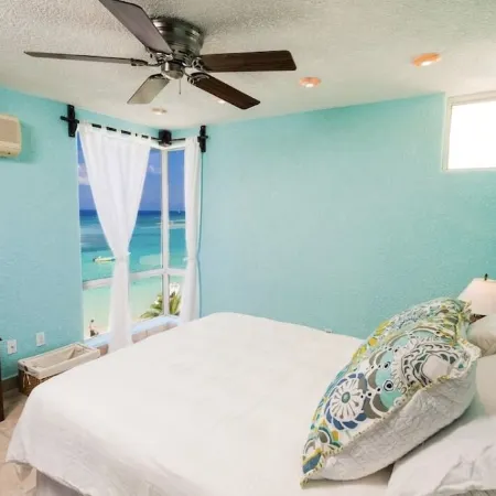 $3,000,000 Luxury Beach Front (4) Bedrooms Condo famous West Bay Beach Sleeps 8