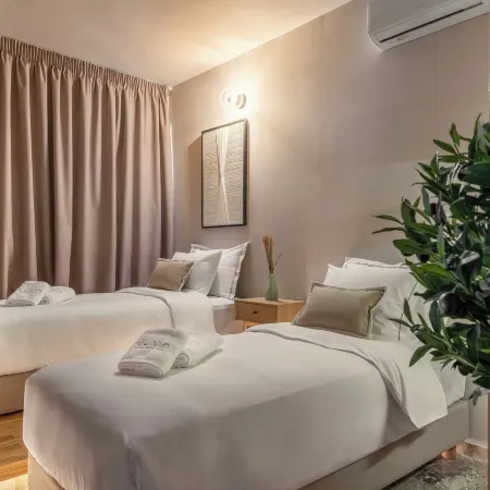 Num Suites & Lofts Athens Отели рядом с достопримечательностью «Неос-Космос»