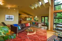 Modern home in wooded area with views of Lake Washington