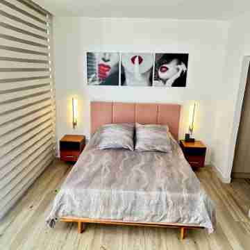 Charming 1 bedroom apartment with fast WiFi & fitness room in Majestic Quito. Rooms