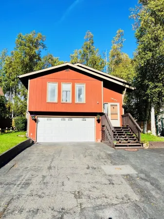 Scenic, cheery, and bright Eagle River home base to adventure.