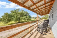 Charming Tiny House Retreat with Cozy Porch - Inviting Escape