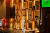 Golden Tulip Garden City Hotel - Rivotel - bar
