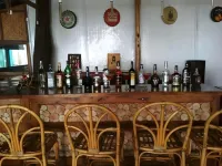 Village Sunset Paradise Beach Resort - bar