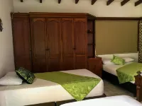Comfortable Room with 3 Double Beds in Best Area of Coffee Region