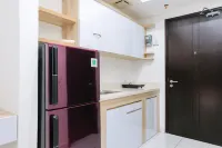 Homey Studio at Casa de Parco Apartment by Travelio