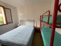 Alloggio con giardino in comune vicino al mare