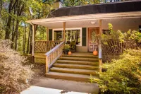 Luxury & Tranquility on 8 Acres Bordering Brush Creek! Secluded 3-Level Home.