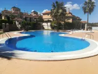 Townhouse with communal pool and jacuzzi, located a few meters from the beach. Hotel a Calas de Mallorca