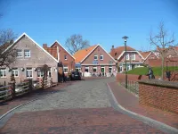 Four stars at the harbor: Modern renovated fisherman's house directly at the Ditzumer harbor