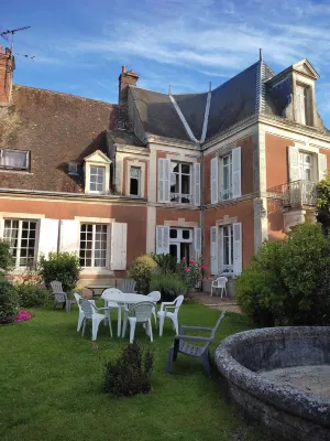 Village property in the Perche region with basic shops and SNCF train station. Hotel a Bretoncelles