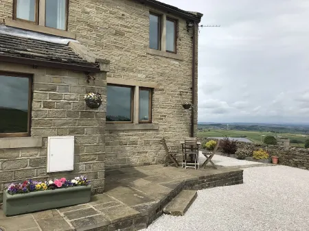 Law Brook Farm cottage with stunning views .