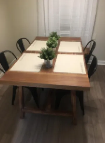 Coastal Comfort 1 mile  from the beach and downtown. HOT TUB and outdoor dining.