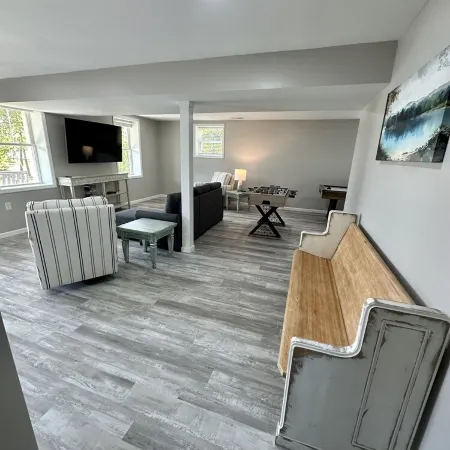 BRAND NEW Lake Front home. Private cove and boat dock! Modern farmhouse appeal!