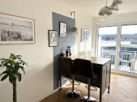 Close to the city center with parking space, balcony, lockable bike box & charging station