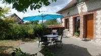 At the foot of the Abbey in the heart of a small village and 9 km from Rouen
