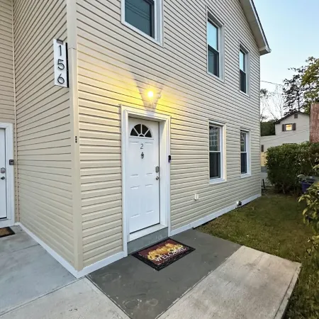 Charming Mountain-View Waterfront Retreat – Hot Tub, Sauna, Game Room & Fire Pit