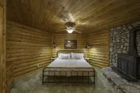 Lakefront secluded mult-family retreat with game room and two cabins.