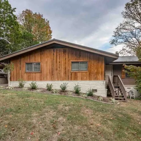 Amazing Lake and Smoky Mountain Views from this Charming Lake House.