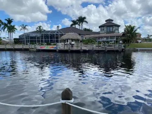 Stunning SW home w/perfect indoor-outdoor living! Infinity pool/spa/great canal.