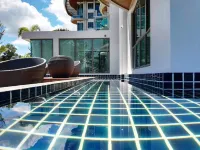 Beachfront accommodation in Sriracha with a private beach