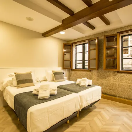 Hostal Nomade Santiago Отели рядом с достопримечательностью «Дворец Фонсека»