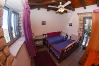 Stone Maisonettes Hotels in Aigio