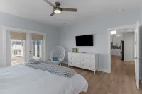 Luxurious Amenities and Steps to the Shoreline - Elegant Coastal Retreat