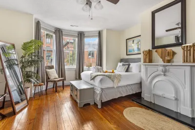 Charming Historic Home with Tranquil Backyard Patio - Elegant Retreat