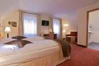 Romantik Hotel Zur Schwane Hôtels à : Volkach