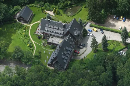 Das Jagdhaus Waldidyll Erzgebirge Отели в г. Грюнхайн-Байерфельд