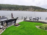Fantastic fishing hut with sea view directly on the water Hotels in Lyngdal