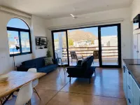 Apartment with mountain view, private balcony and access to beach front terrace.