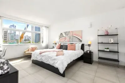 King size one bedroom condo steps away from beach