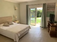 Large private detached three bedroom villa with heated infinity swimming pool